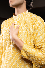 Yellow Silk embroidered Kurta.
